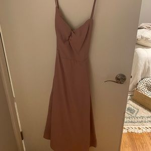 Adorable and fun mauve midi dress.